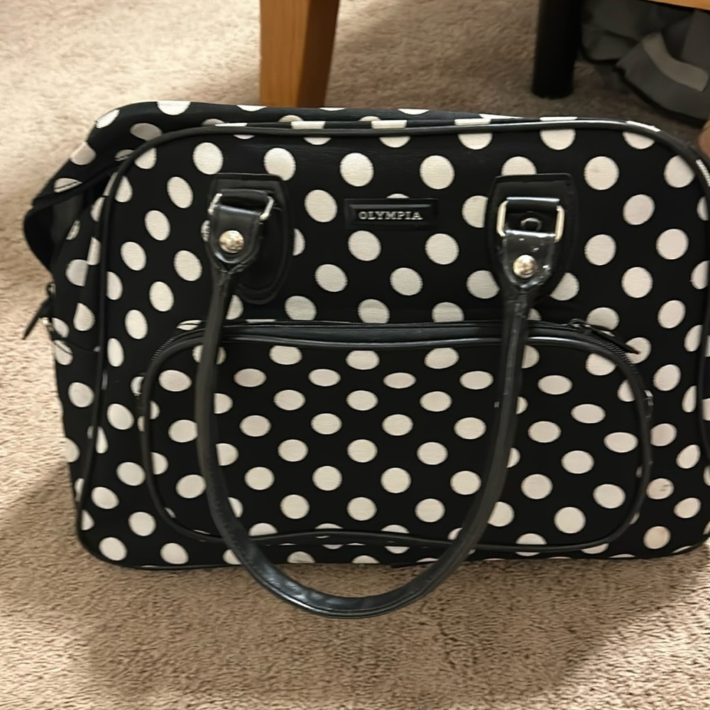 Olympia black and white polka dot carry bag